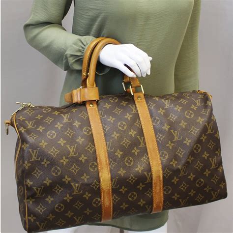 louis vuitton hard case purse|louis vuitton duffle bag 50.